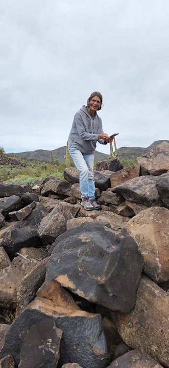 lady on boulders