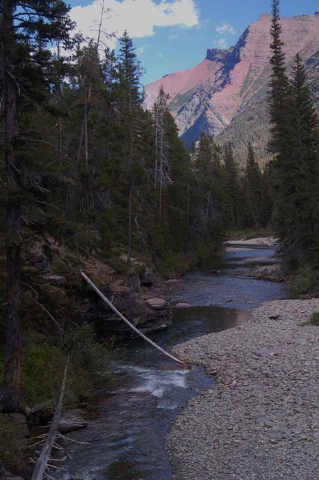 Surrounding mountains on the Virginia Falls hiking trail