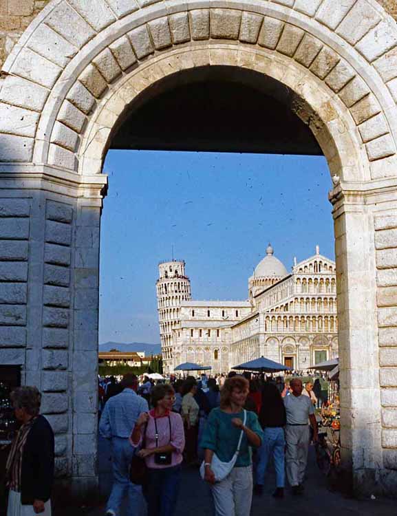 leaning tower seen thru archway