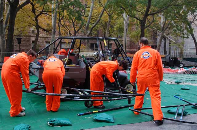 workers inflate balloon