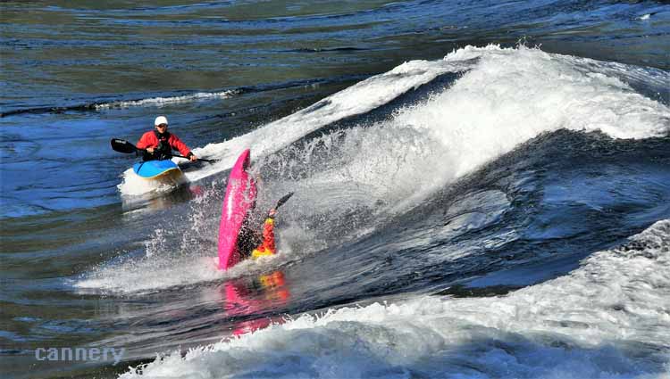 kayaker on waves