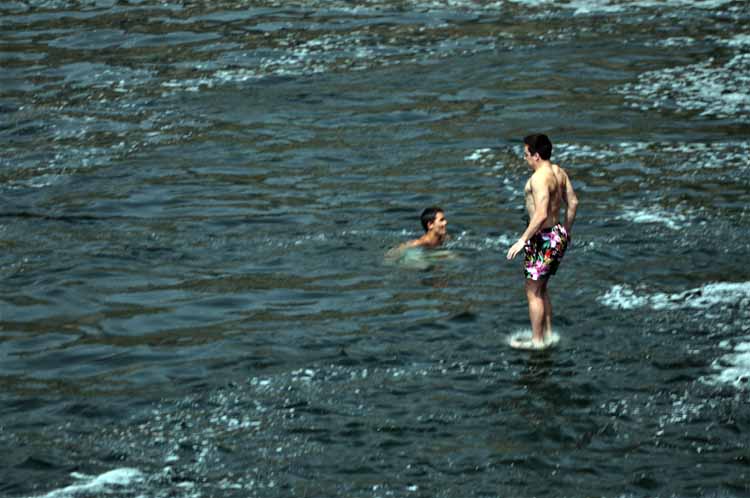 cliff-jumping into river