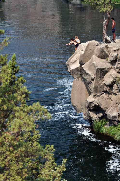 cliff-jumping into river