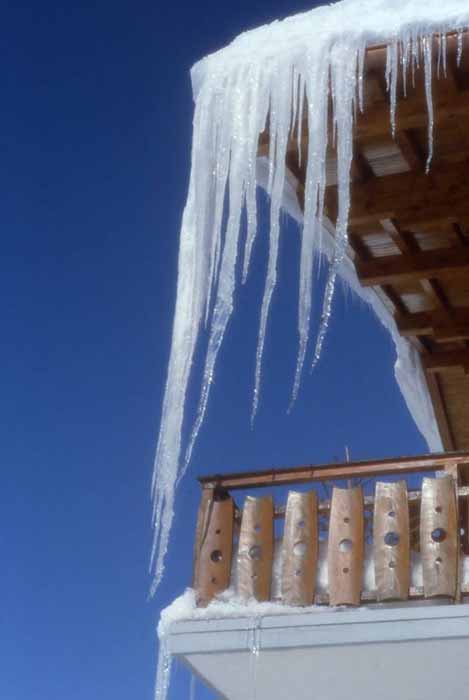icicles hang from a roof in Verbier