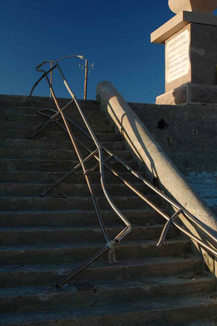 Stair railing from the seawall to the sand