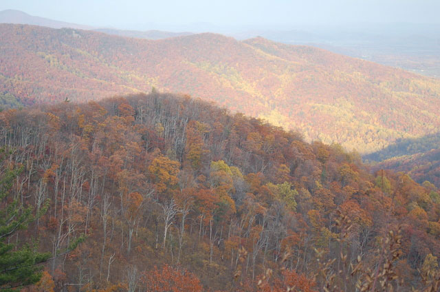 sun shining on autumn hills