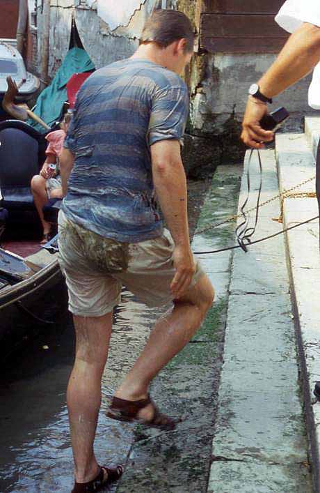 man wet after slipping into canal